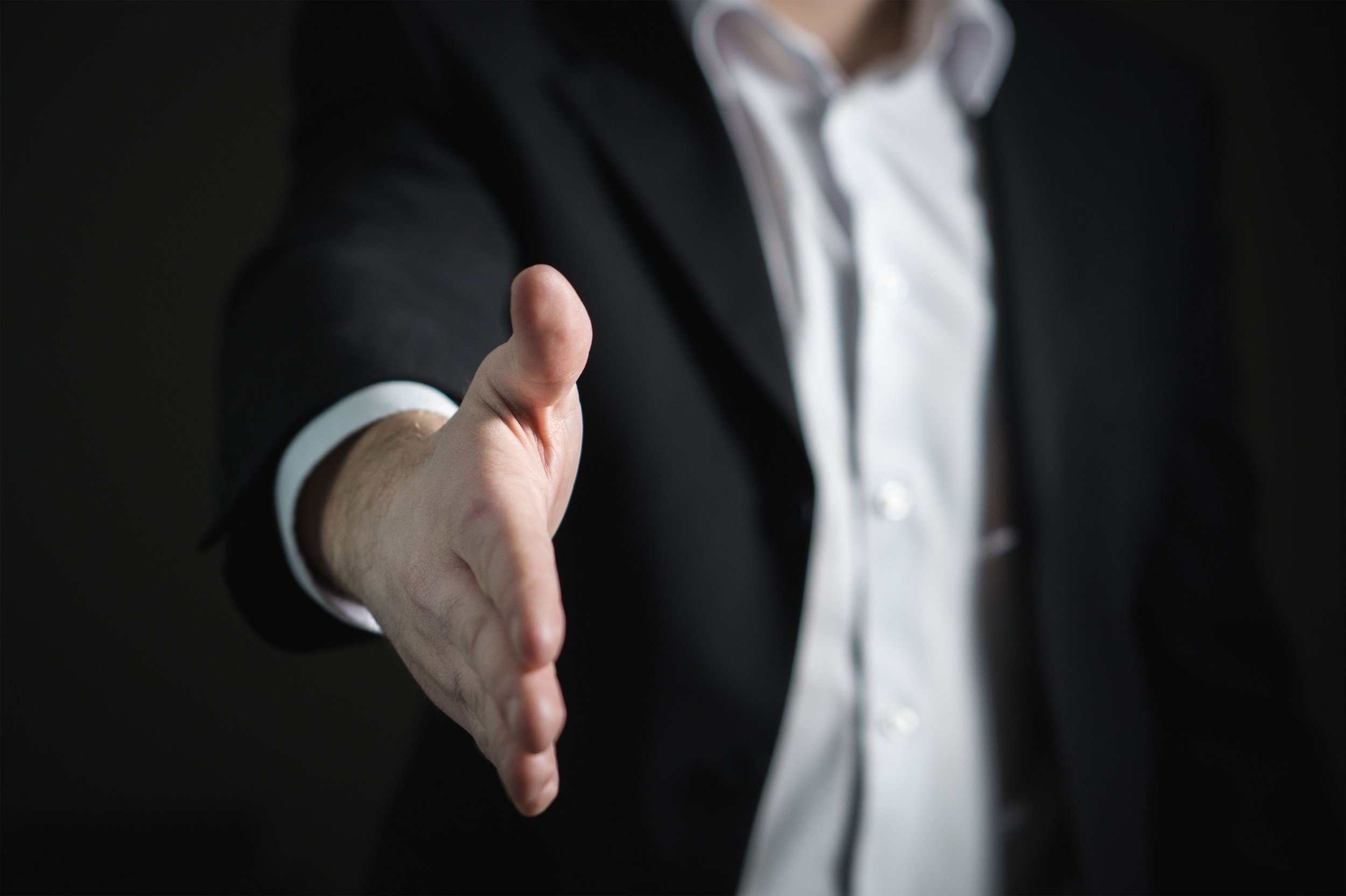 Business handshake representing an international transaction